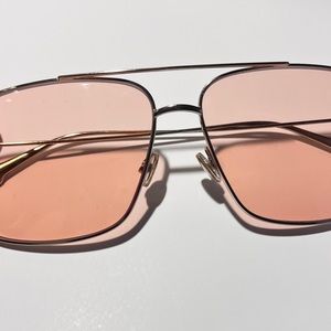 Dior pink sunglasses it’s too small for my face.